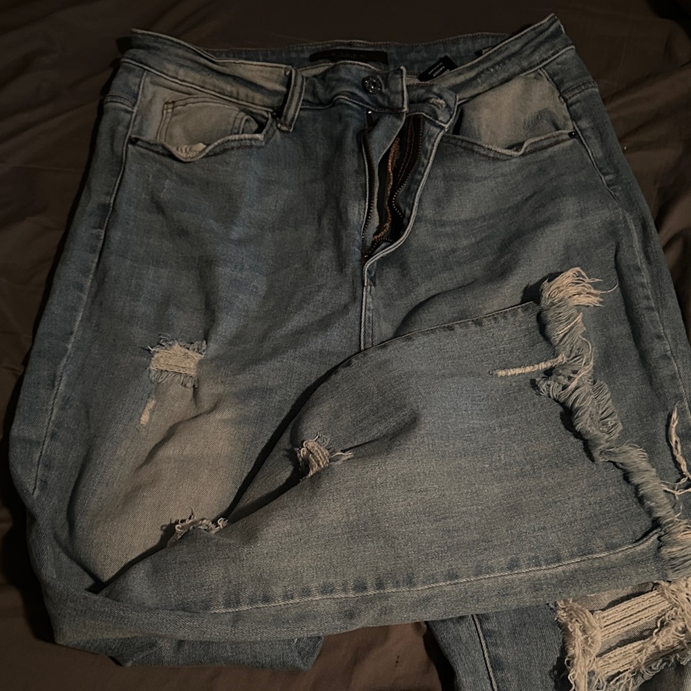 Distressed Blue Denim Jeans
